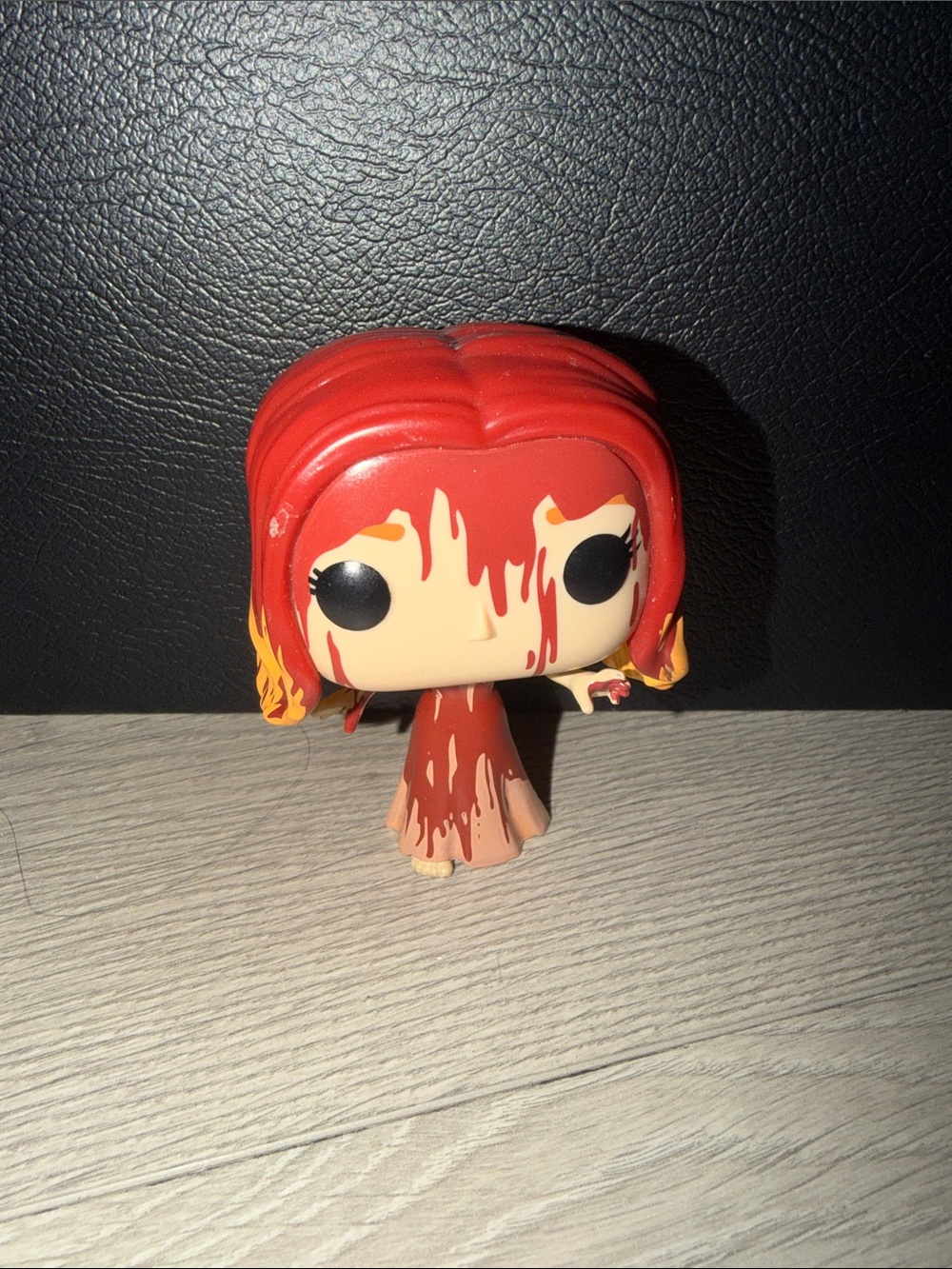 Funko Pop! Red and Yellow Female Figure with Dripping Paint Effect